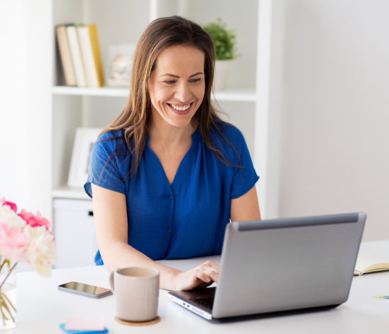 woman working on content writing while smiling